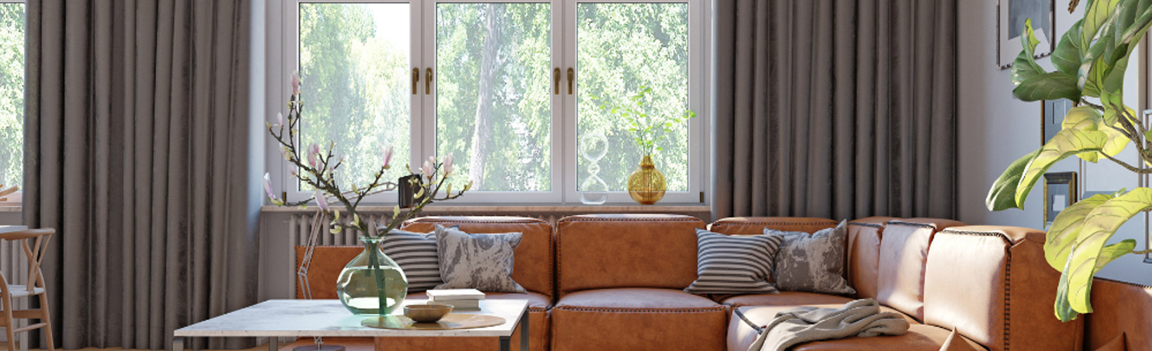 Blick aus einem gemütlichen Wohnzimmer durch das Fenster in den Garten - bei Meinfenster24 können Sie unkompliziert Fenster online kaufen.